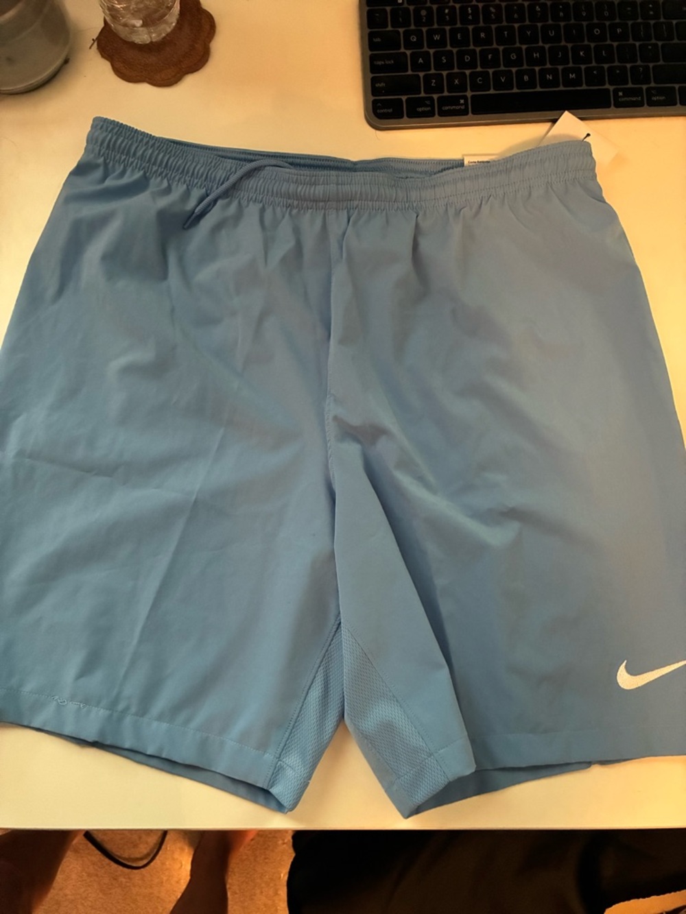Nike Men’s Sky Blue Athletic Shorts with White Swoosh